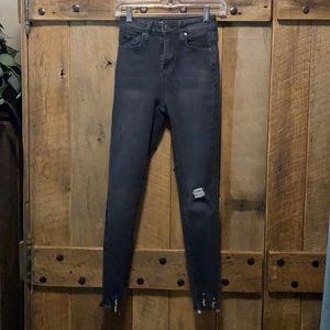 Like new! High rise black distressed jean.